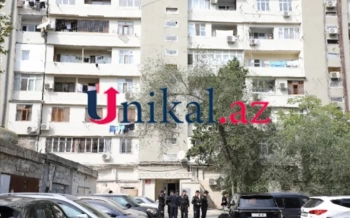 Bakıda oğlunu öldürən qadın özünü binadan atdı - Foto